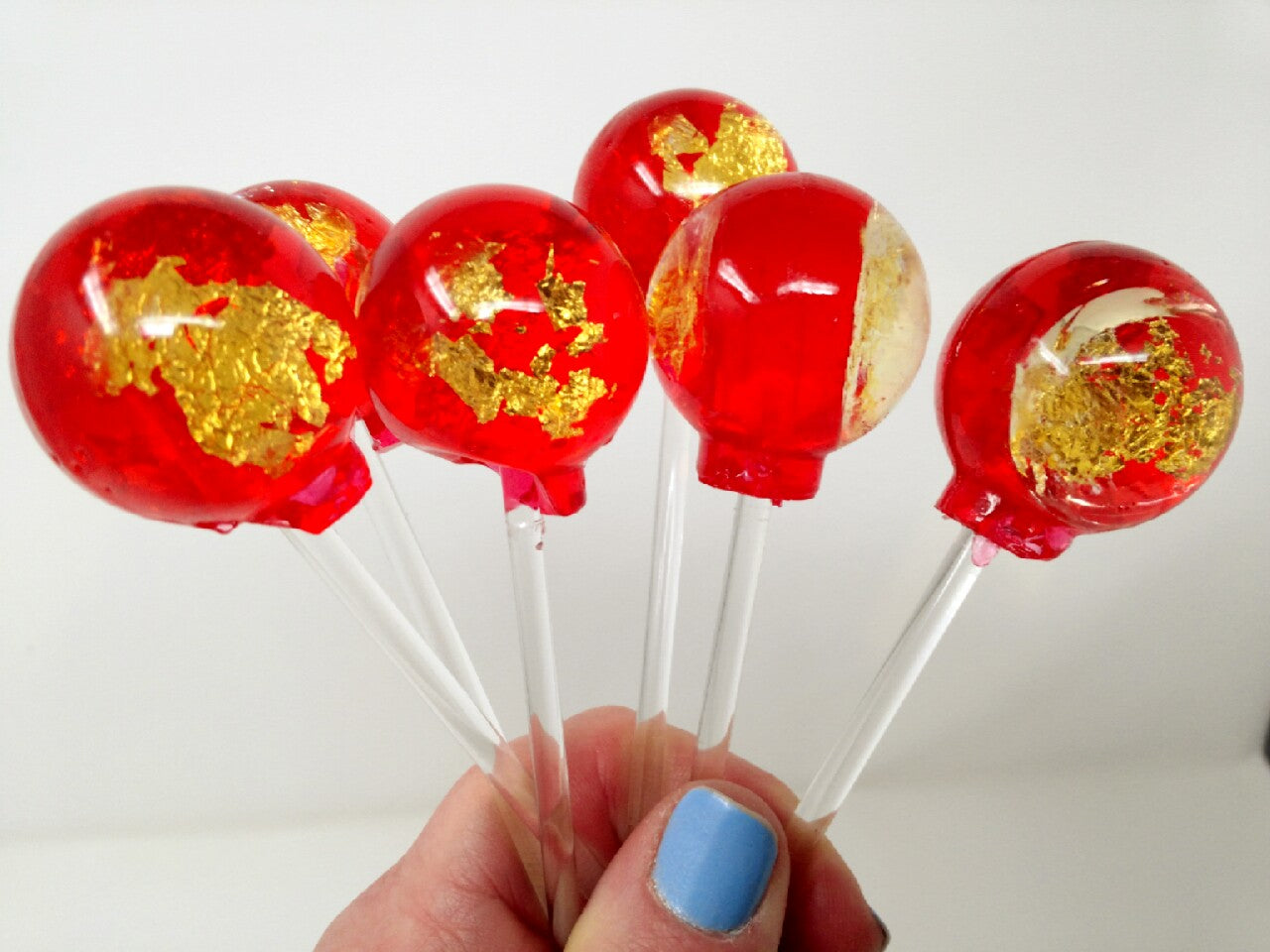24K Gold Red Passion lollipop by I Want Candy!