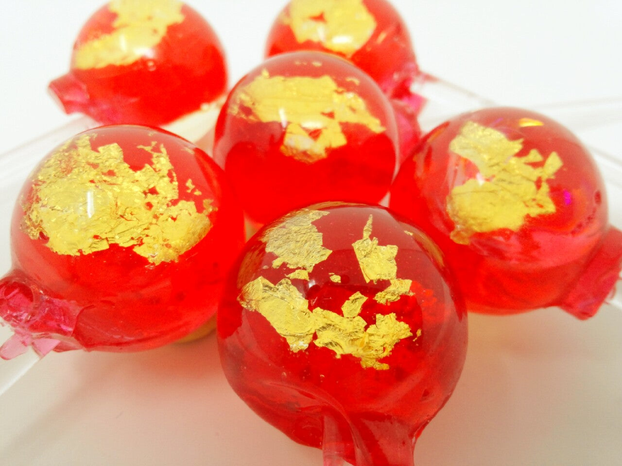 24K Gold Red Passion lollipop by I Want Candy!