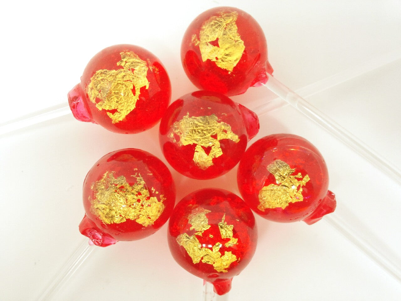 24K Gold Red Passion lollipop by I Want Candy!