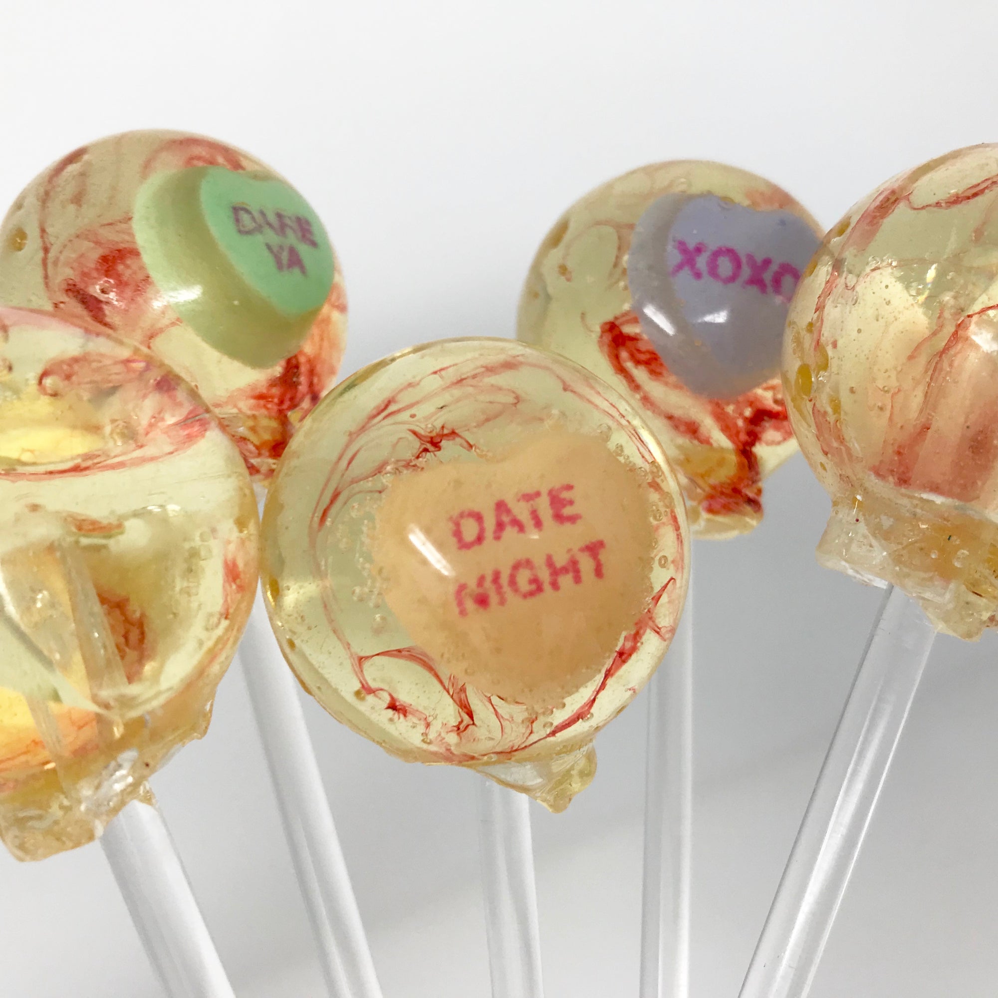 Conversation hearts lollipops by I Want Candy!